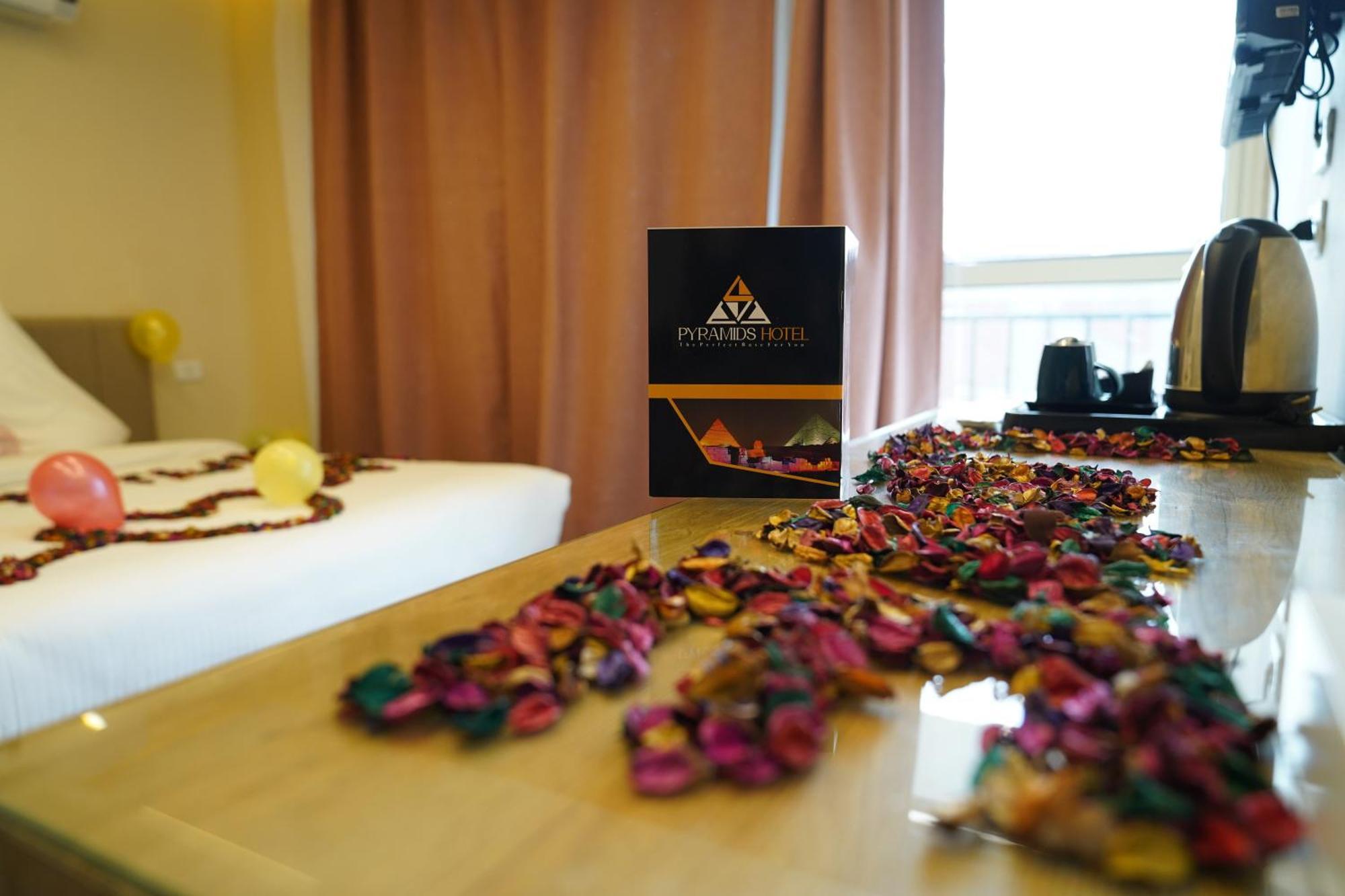 Pyramids Hotel Kafret el-Gabal Esterno foto