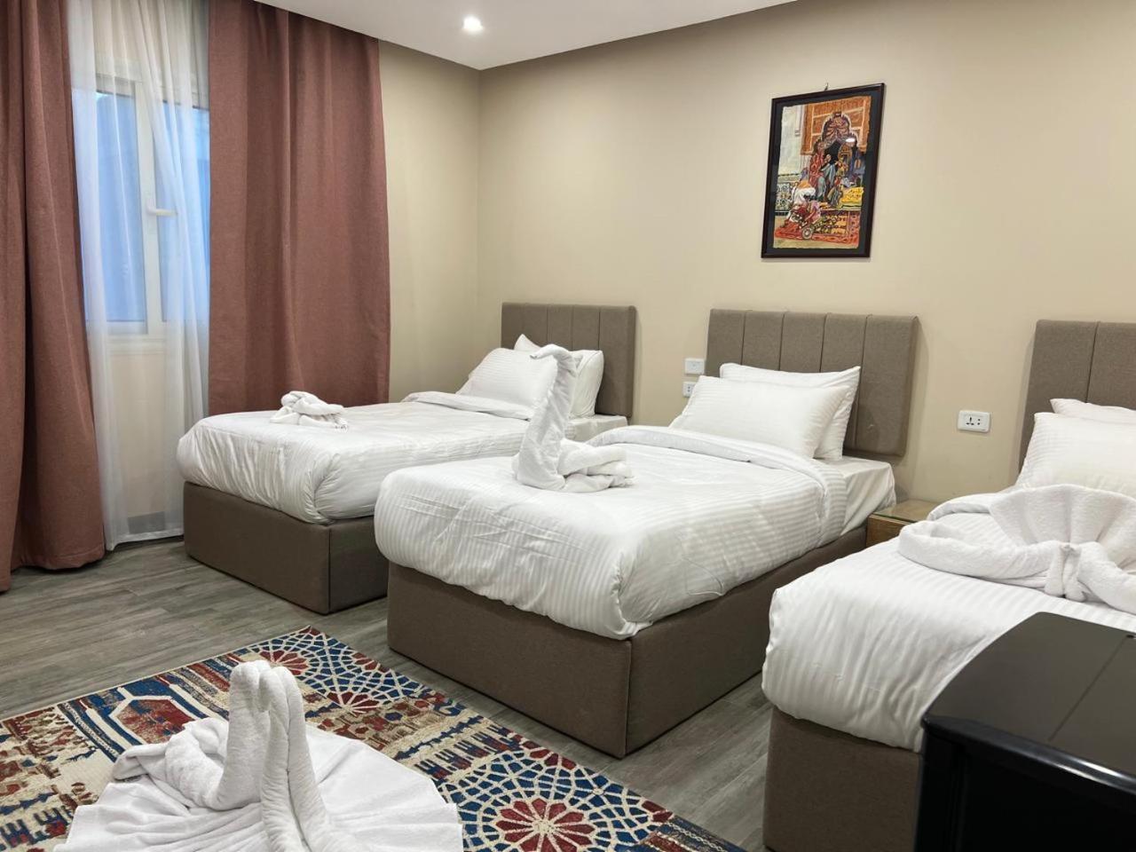 Pyramids Hotel Kafret el-Gabal Esterno foto