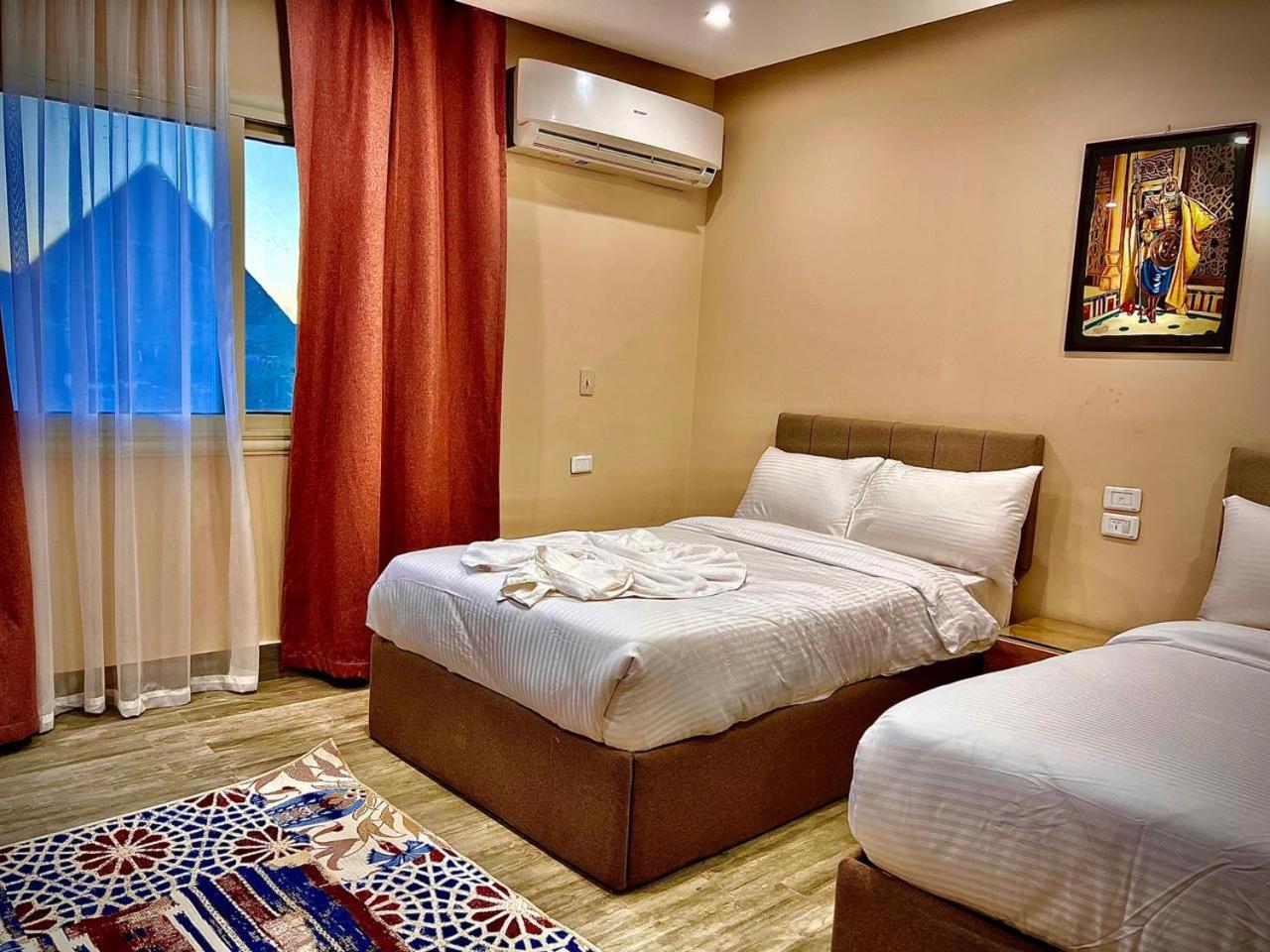 Pyramids Hotel Kafret el-Gabal Esterno foto