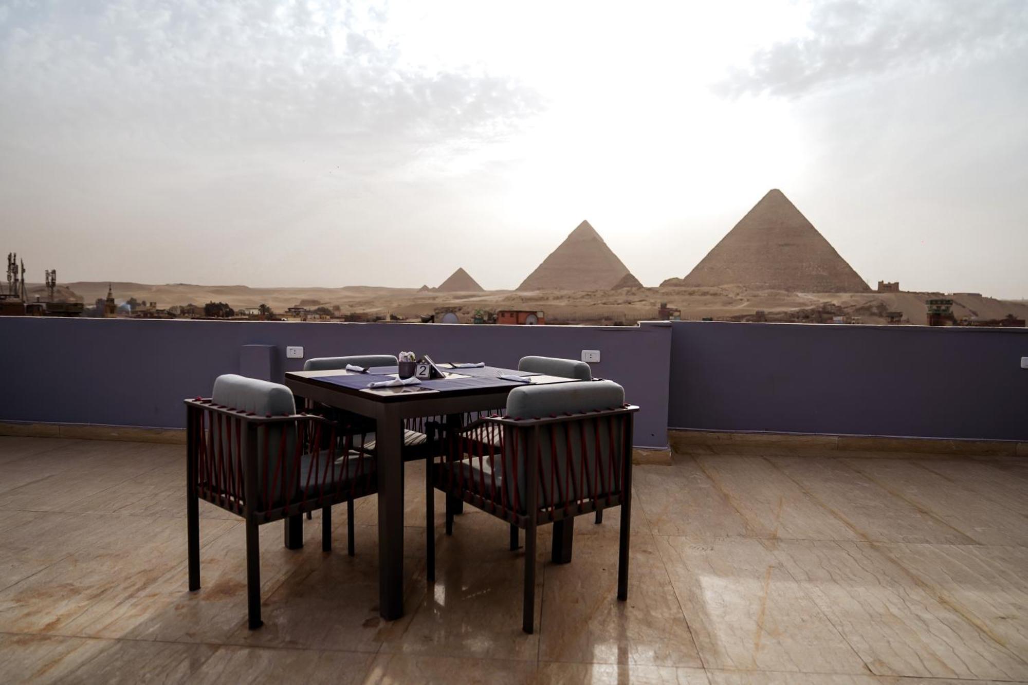 Pyramids Hotel Kafret el-Gabal Esterno foto