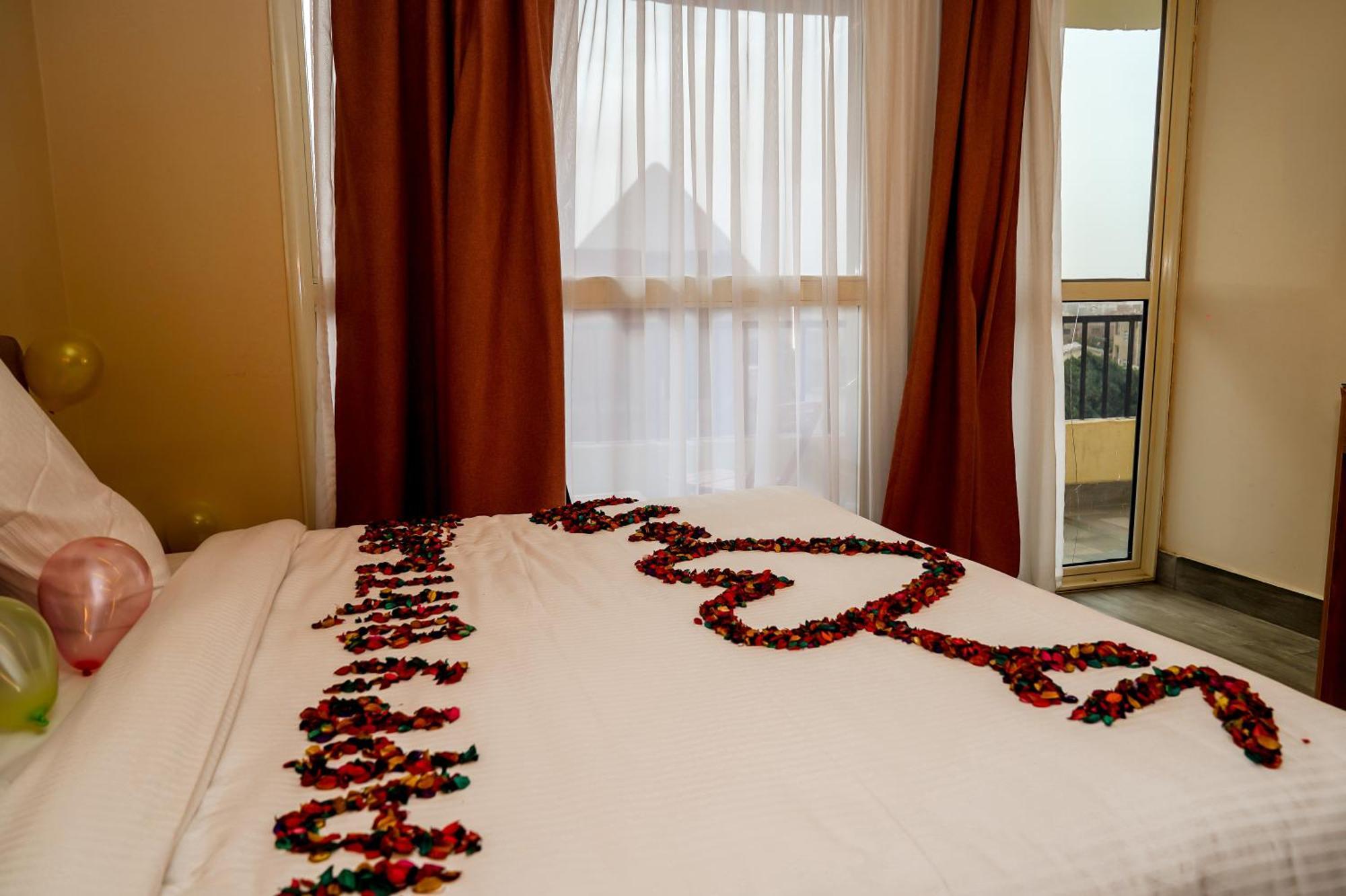 Pyramids Hotel Kafret el-Gabal Esterno foto