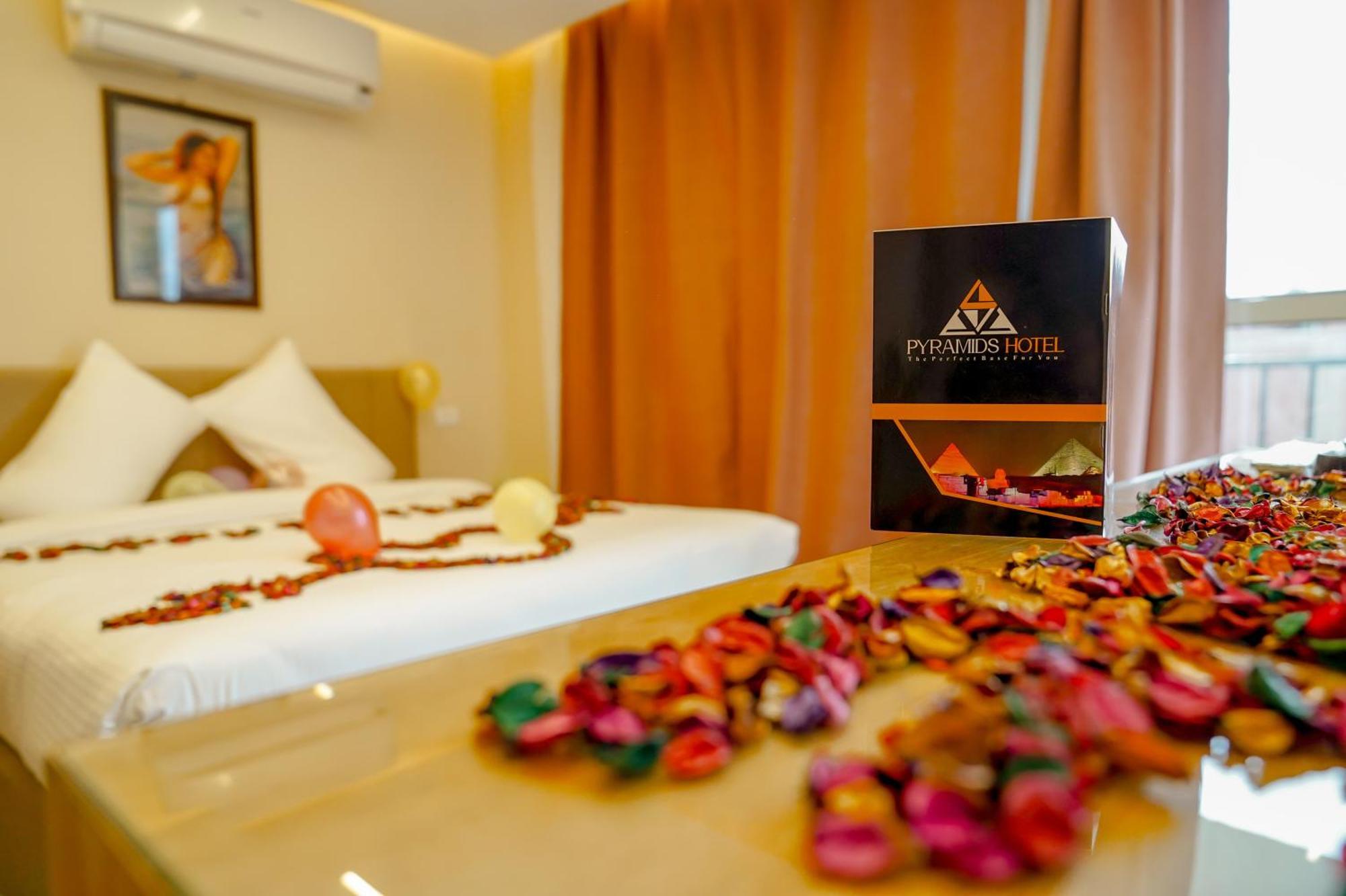 Pyramids Hotel Kafret el-Gabal Esterno foto