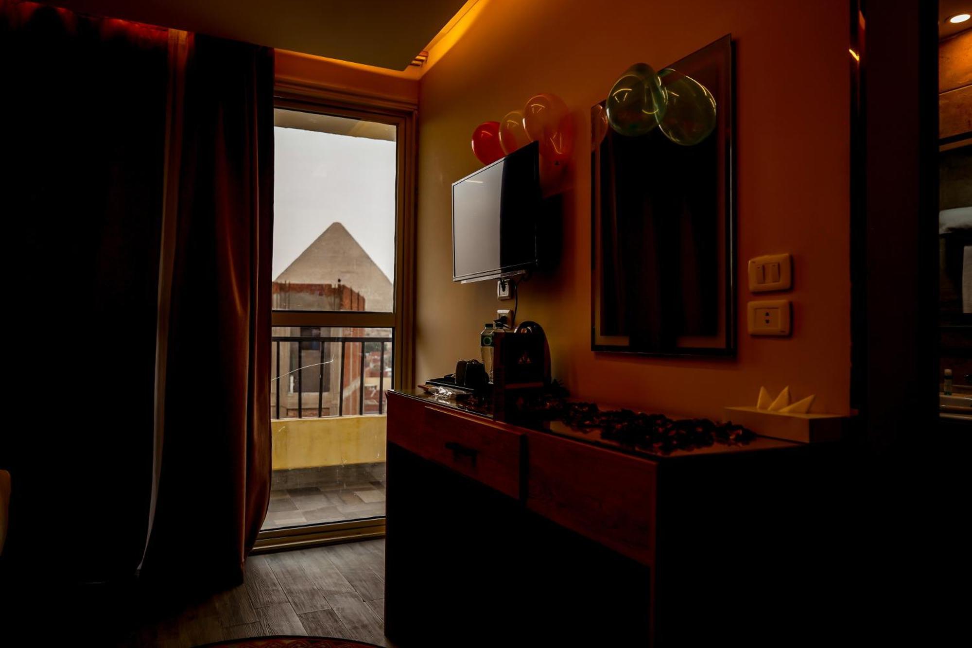 Pyramids Hotel Kafret el-Gabal Esterno foto