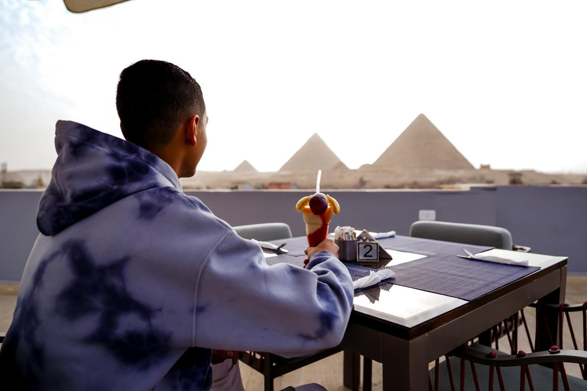 Pyramids Hotel Kafret el-Gabal Esterno foto