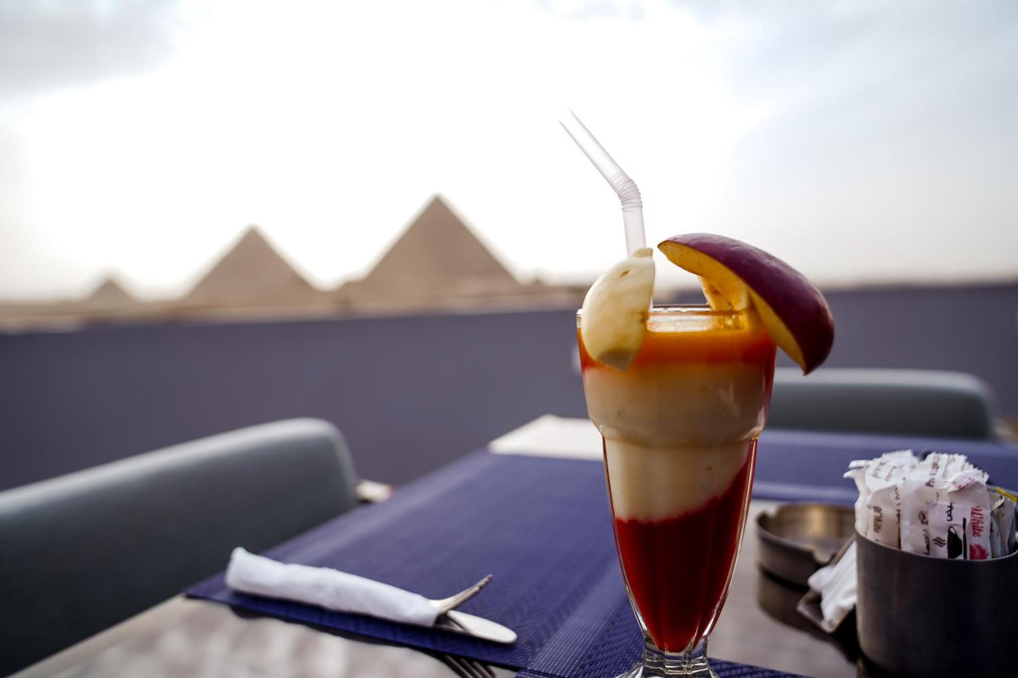 Pyramids Hotel Kafret el-Gabal Esterno foto