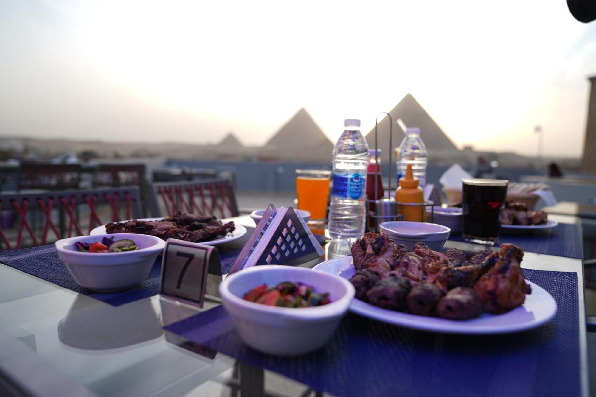 Pyramids Hotel Kafret el-Gabal Esterno foto